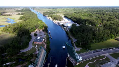 Aerial-Flying-Over-Open-Drawbridge-Across-Intercoastal-waterway-In-Chesapeake