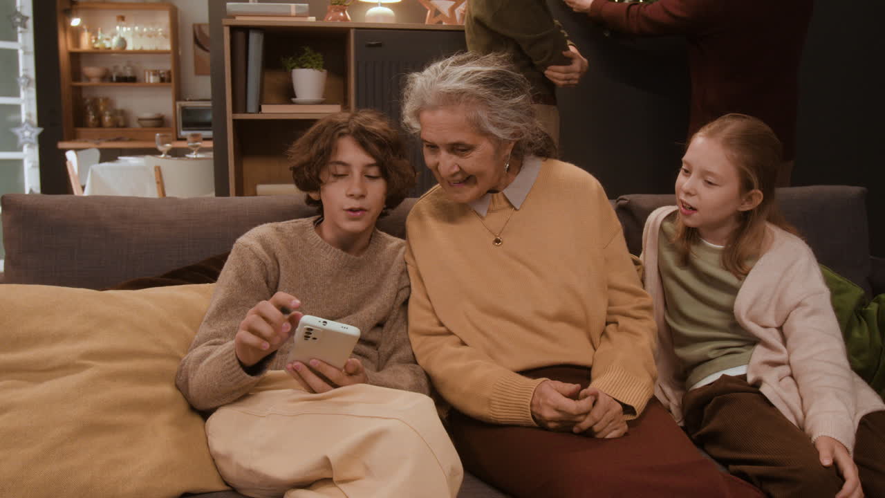 Family using a phone at home