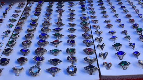 a lot of silver rings in a traditional market in taxco guerrero