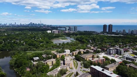 drony flying over a sunny etobicoke near lake ontario