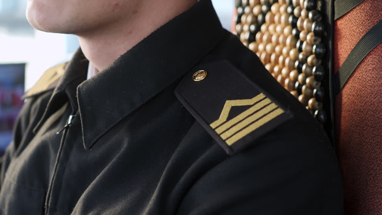 Close-up of a uniform shoulder with epaulet