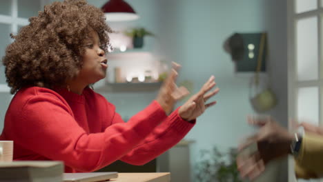 black man and woman arguing at home