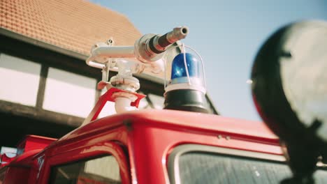 Close-up of a Fire Truck's Water Cannon and Blue Light