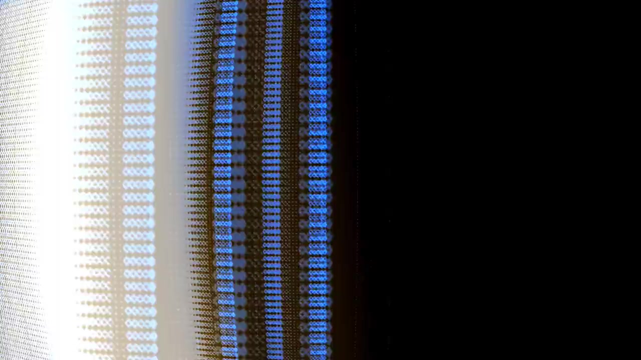 Abstract Digital Light Patterns Moving Across Dark Background