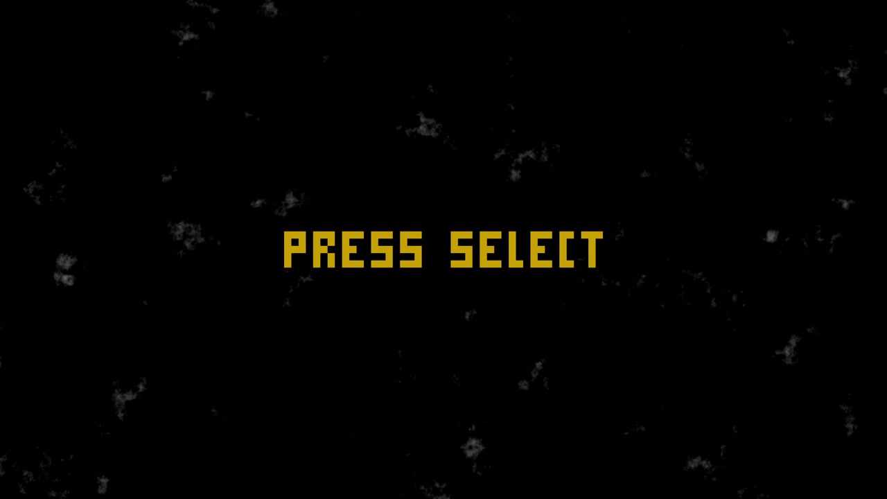 Blikající pixelovaný text 'Stiskněte Select' na tmavém pozadí