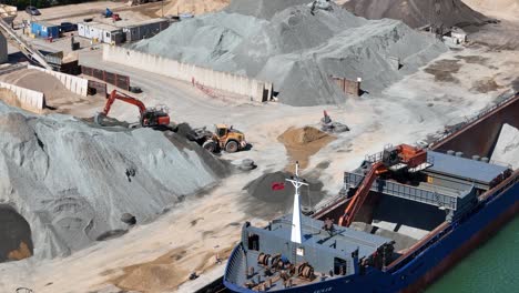 unimetals ipswich uk excavators unloading ship panning drone aerial