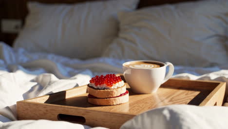 breakfast in bed with coffee and cake