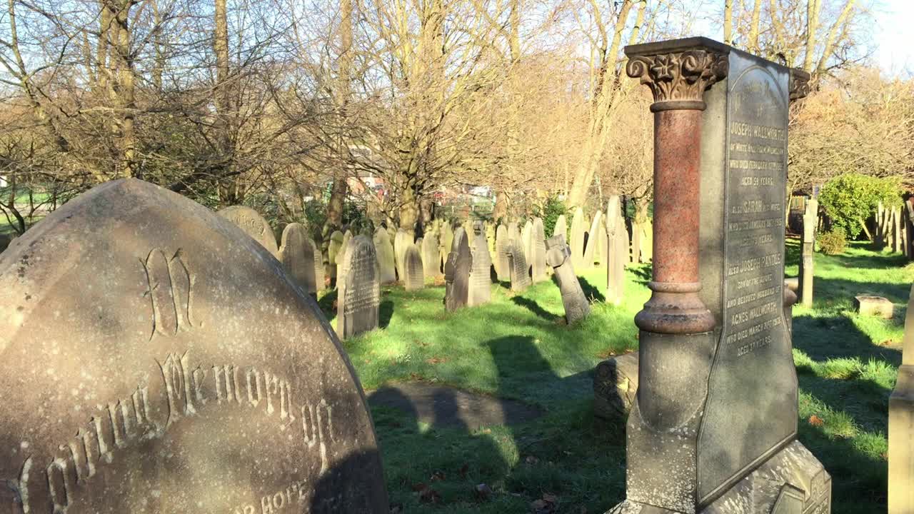 Gravestones in the graveyard of St Bartholomew's Church in the town of Wilmslow, Cheshire, England.