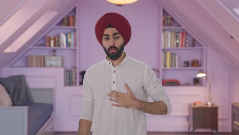 hombre indio sikh enfermo con un ataque de asma