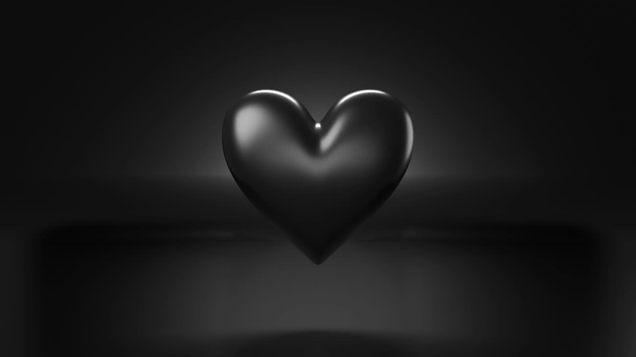 objeto en forma de corazón negro pulsante en fondo negro. animación 3d en bucle.
