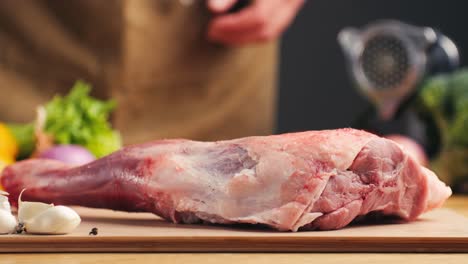 preparing raw lamb shoulder