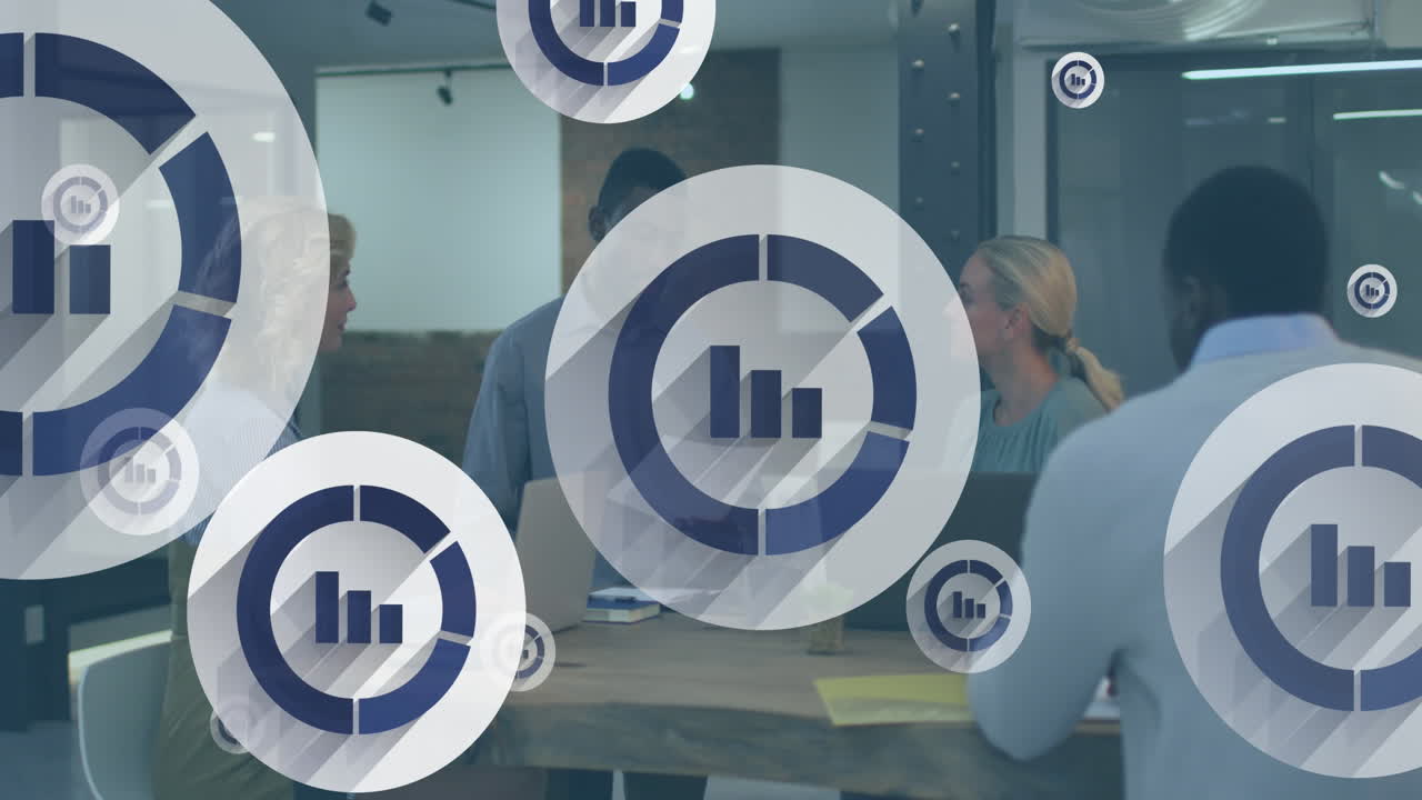 Animation of graph icon in circles over diverse coworkers discussing reports in office