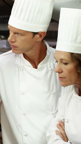 chef explaining a document to his colleagues