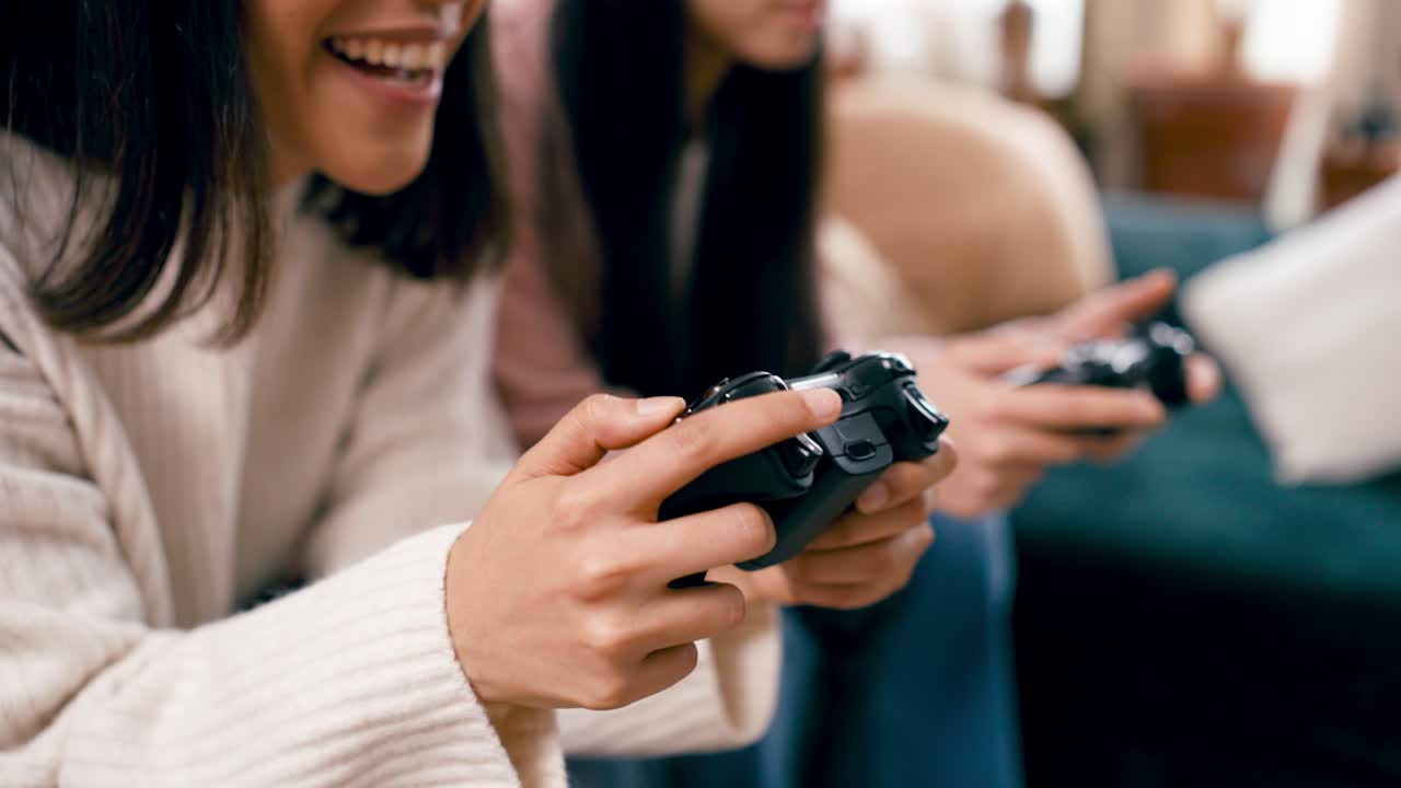 Happy Young Women Playing Video Games at Home