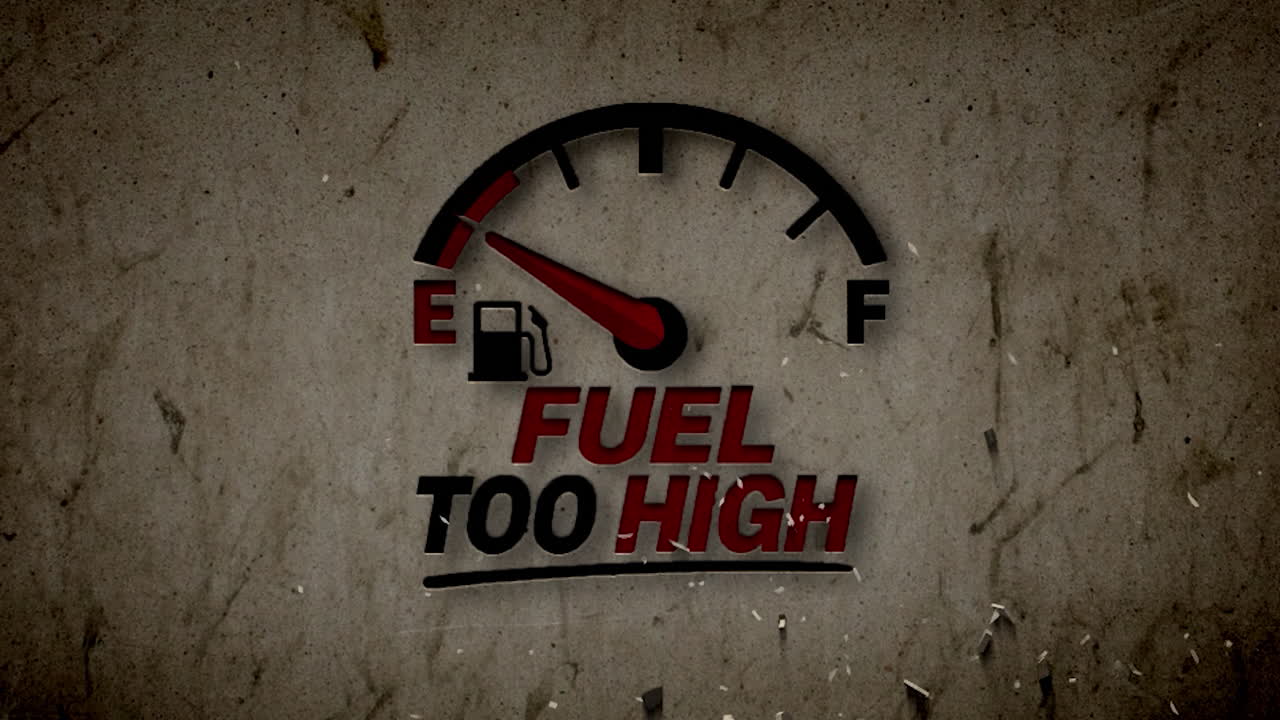 A fuel gauge with 'Fuel Too High' warning on a cracked grunge background