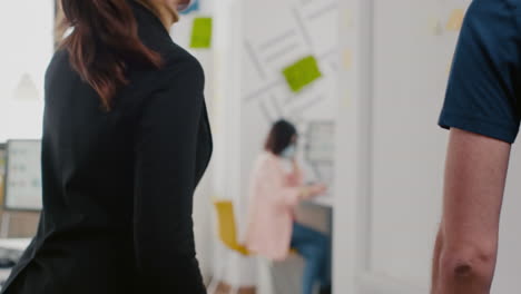 closeup of businesswoman paying takeaway food order with credit card using pos contactless service