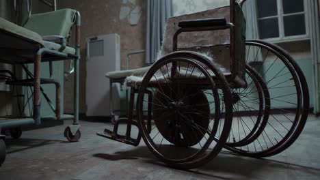 abandoned hospital room with old wheelchair