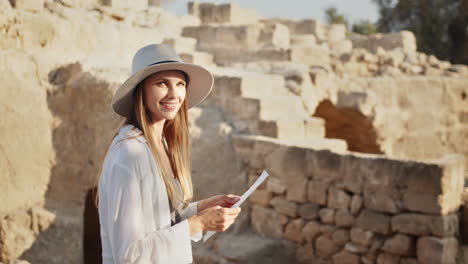 woman exploring ancient ruins