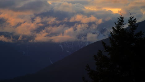 Mountain-clouds-during-sunset---time-lapse