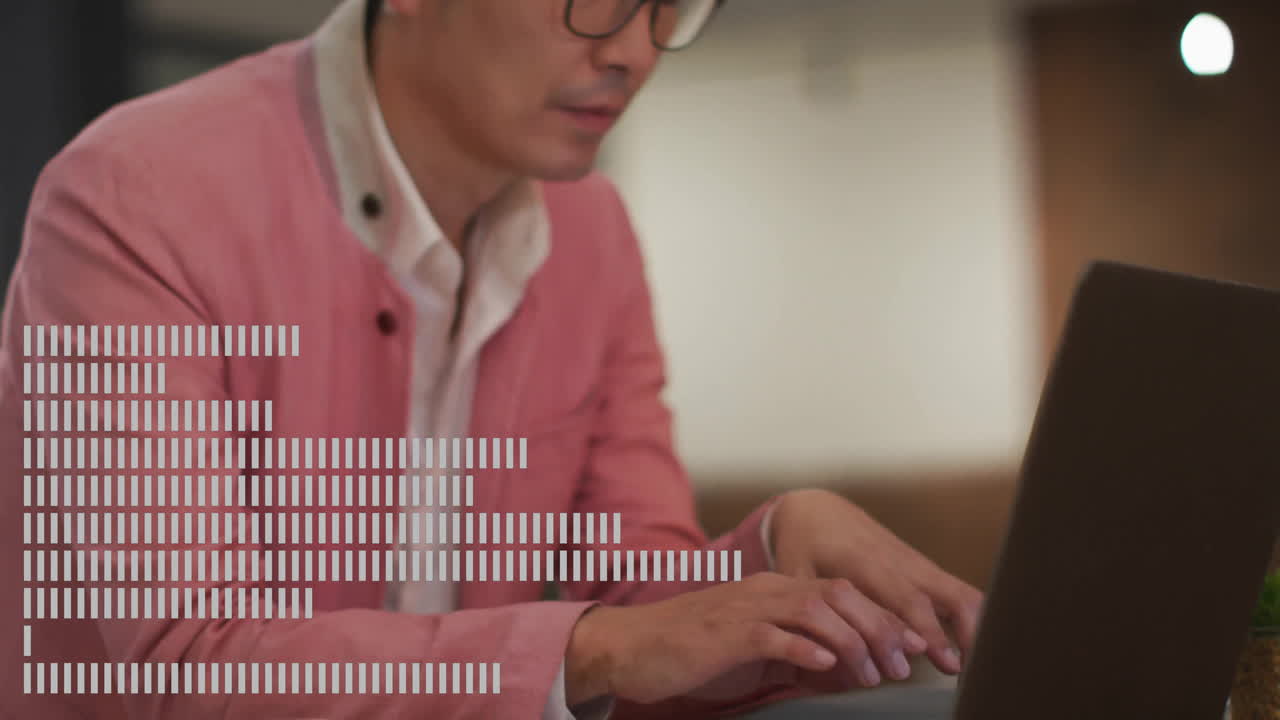 Person in pink jacket typing on laptop with data processing animation overlay