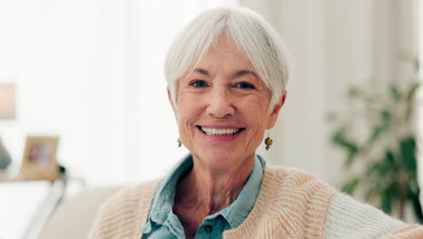 happy, face and senior woman on sofa in nursing