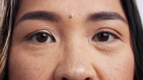Eyes,-face-closeup-and-woman-with-skincare