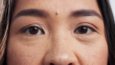 eyes, face closeup and woman with skincare