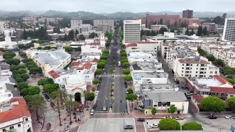 Westwood-Village-and-boulevard-downtown-area-daytime-aerial-flyover