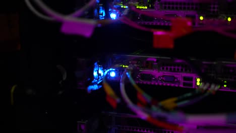 server connectors with fiber optic patch cables at cloud storage server, close up shot