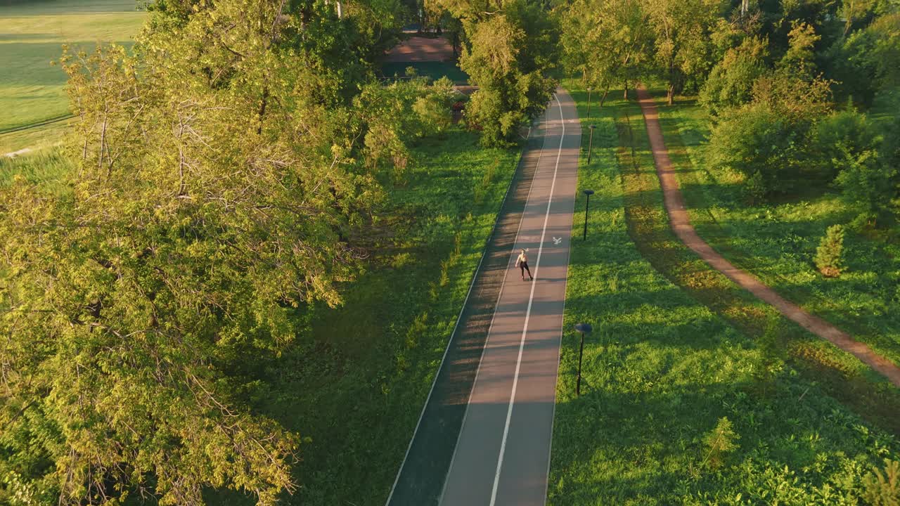 Person Walking Through Park Trail