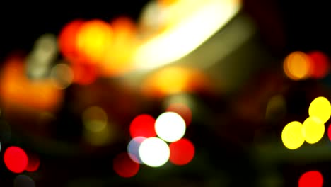 parque de atracciones bokeh por la noche