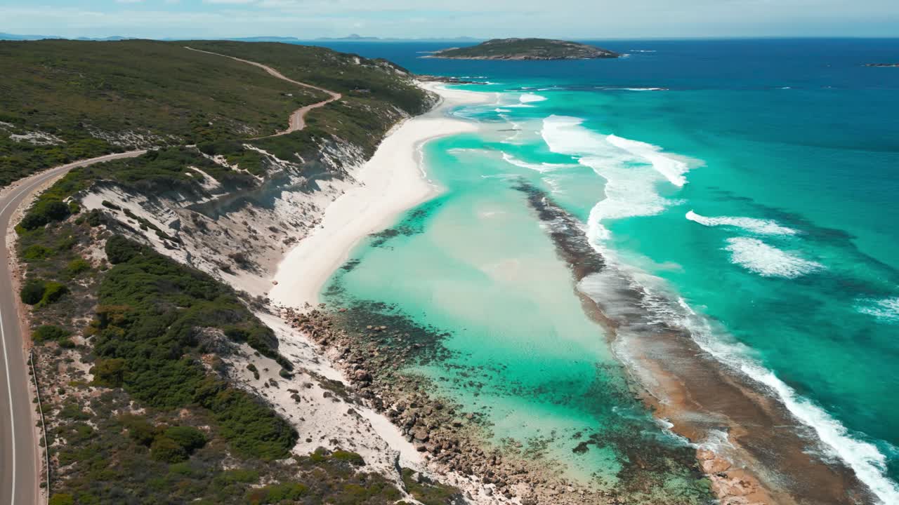 aerial footage over ten mile lagoon and twilight beach road near the city of Esperance in Western Australia on a bright sunny day