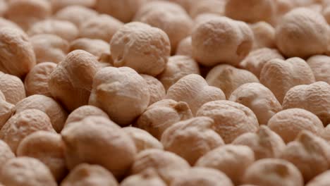 group of raw chickpeas rotating in а circle