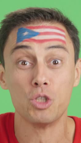 close up of a man supporting puerto rican team