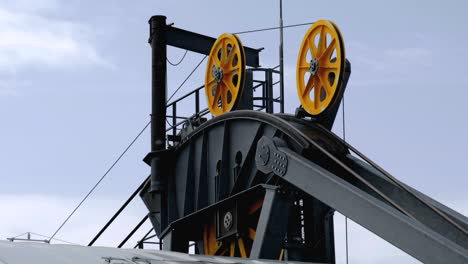 rotating gears wheel machine aerial tramway system mechanism detail close up driveline
