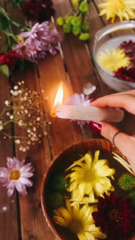 candle lighting ritual with flowers