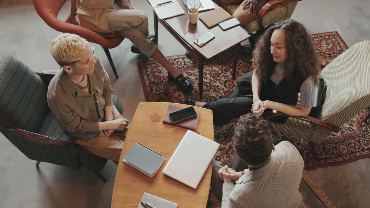 Top-View of Business Colleagues Shaking Hands