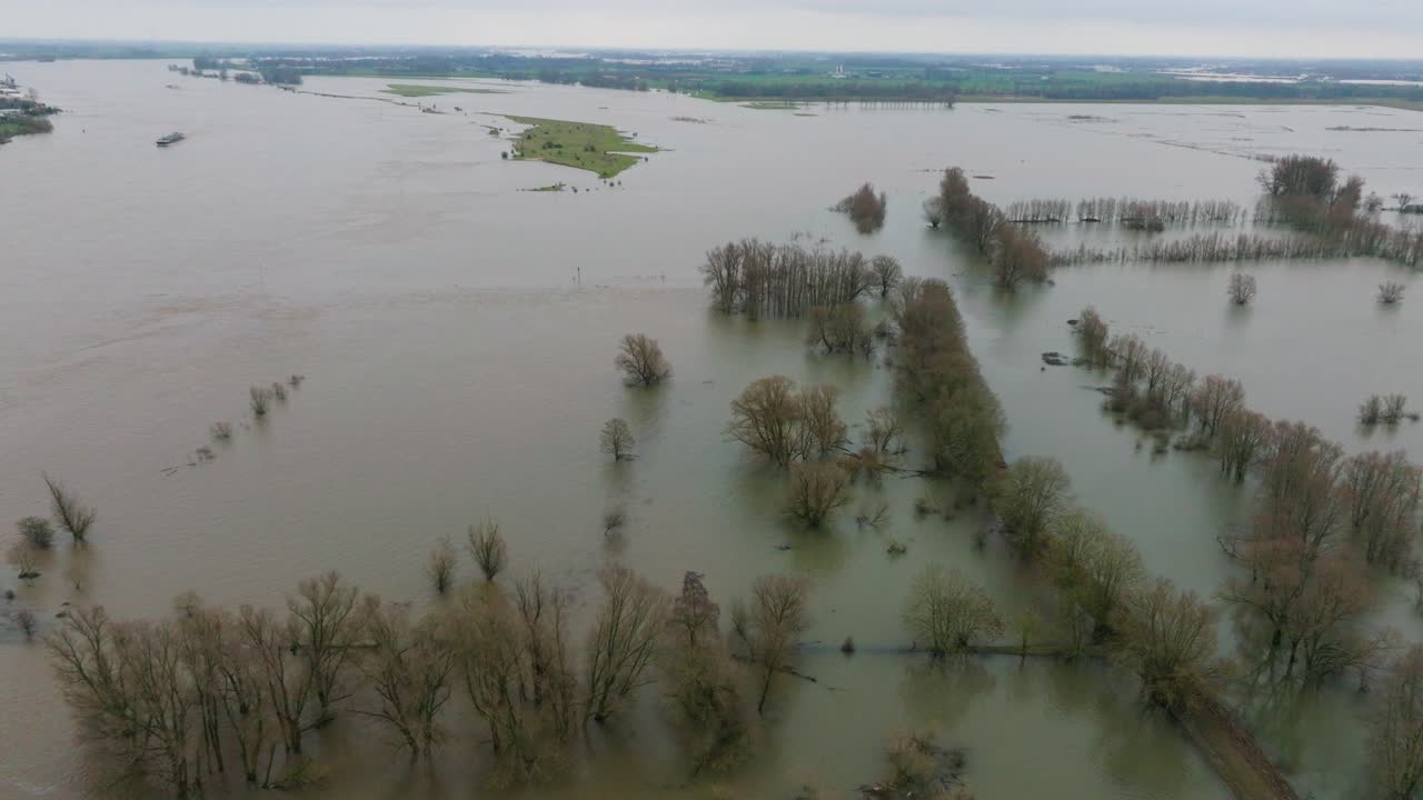 Aerial over flooded countryside around river Waal after heavy rainfall