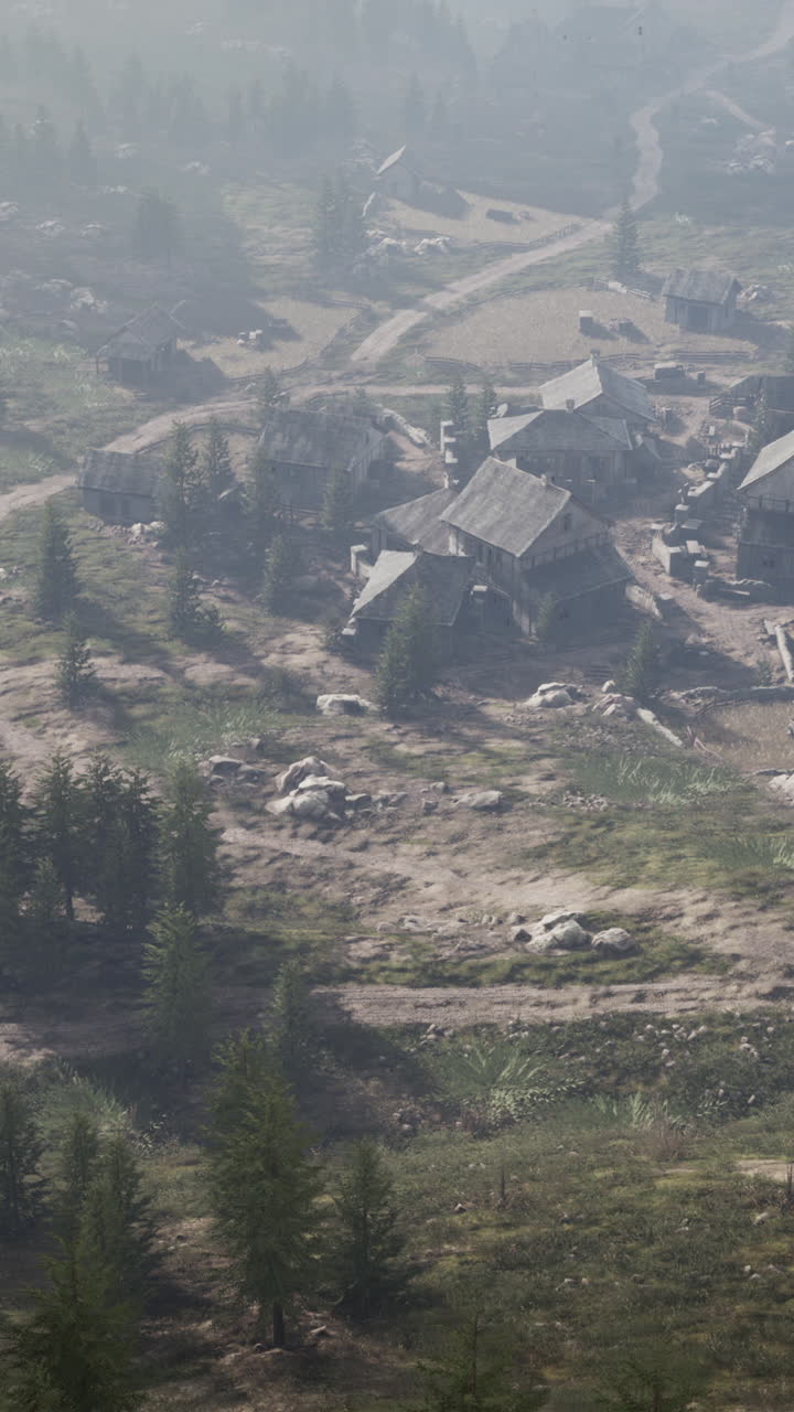 un pueblo medieval con niebla en el bosque