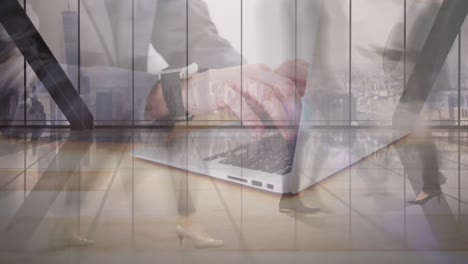 animation of man using laptop with people in office walking in fast pace