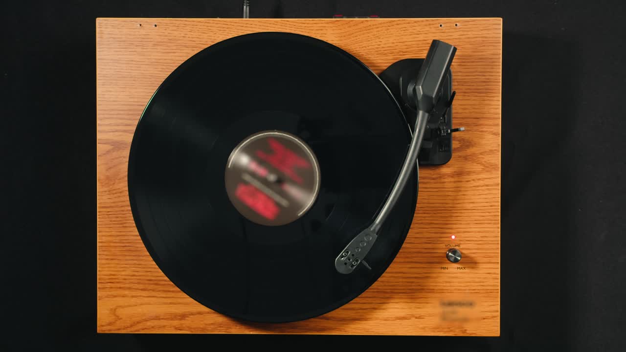 Top Down View of a Vinyl Record Spinning on a Turntable