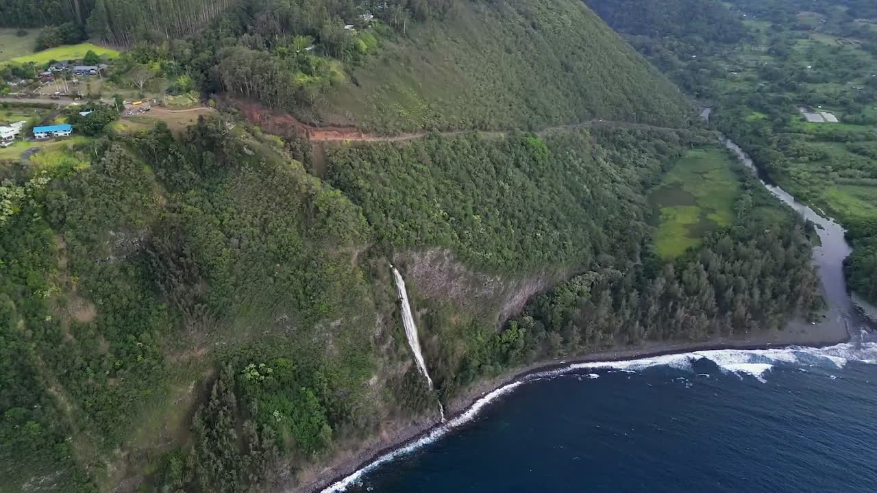 Kaluahine falls flowing into the sea in big island, Hawaii
