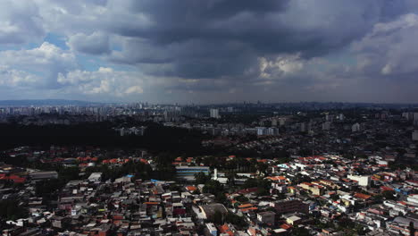 Aerial-view-over-a-favela-neighborhood,-rainy-day-in-Sao-Paulo,-Brazil,-South-America