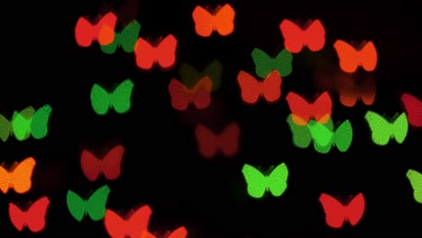 Hermoso-Bokeh-En-Forma-De-Mariposa-De-Luces-LED-Intermitentes,-Verano,-Primavera,-Concepto-De-Fondo-De-Vacaciones,-Espacio-De-Copia