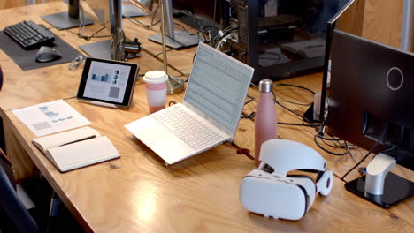 a modern business office desk is equipped with various tech gadgets