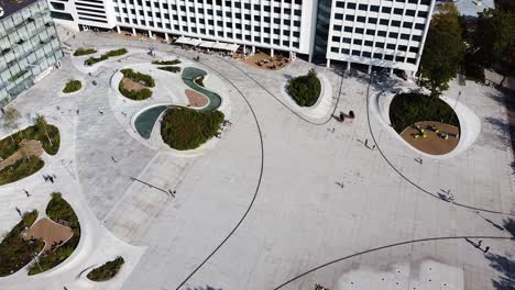 aerial birds eye view of renovated unity square with tiny small people walking on