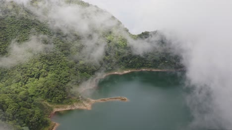 Vivid-Clouds-Revealed-Picturesque-View-Of-Dense-Forest-With-Lake---Lake-Danao-Natural-Park-In-Leyte-Islands,-Philippines