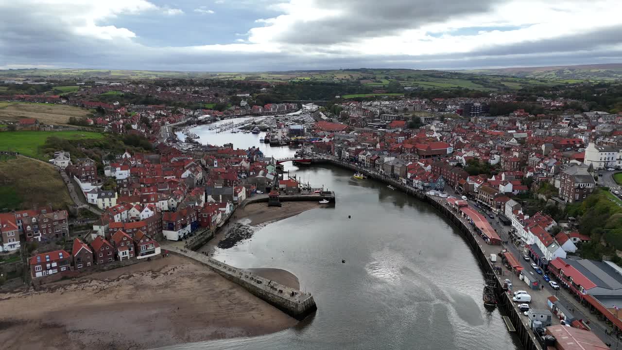 Aerial drone view Whitby Abbey north yorkshire british english seaside port harbour town city england uk