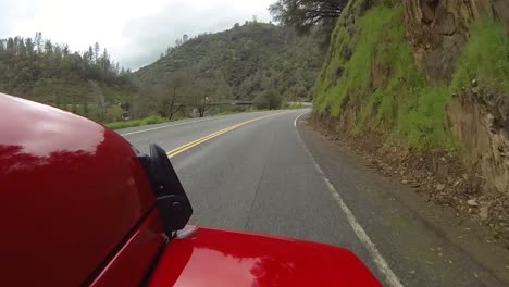 POV-of-red-truck-driving-down-California-highway