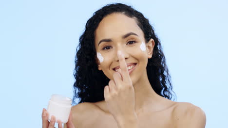 Face,-cream-and-woman-laughing-with-cosmetics
